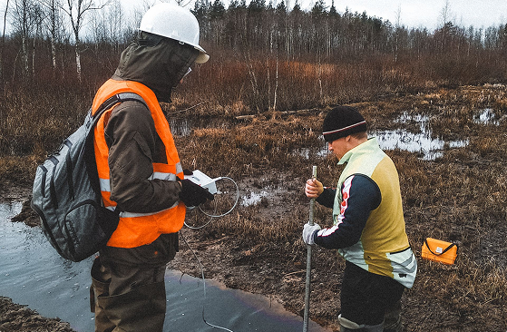 Two government contractors in water quality management, using software to check the streams near an interagency project